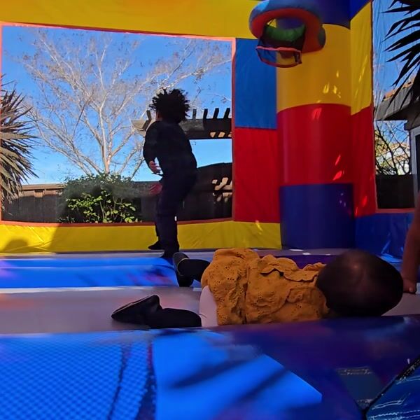 GO BOUNCER LEGO bounce house — kids playing